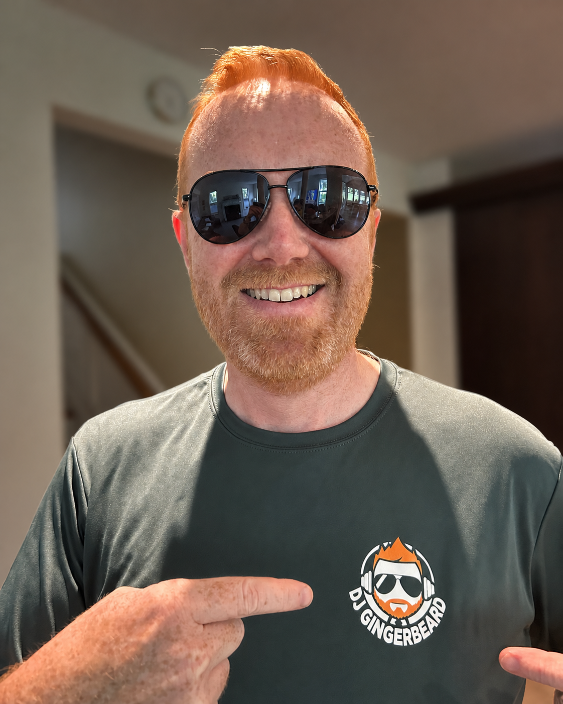 James smiling in a relaxed portrait