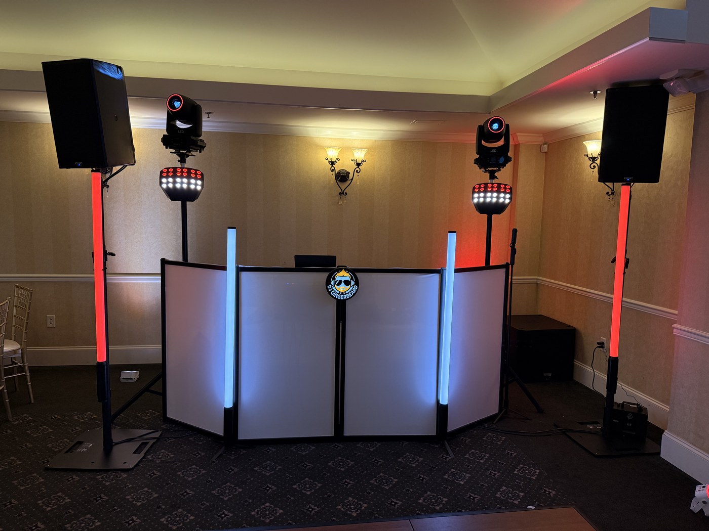 A clean Gingerbeard Events DJ and lighting setup